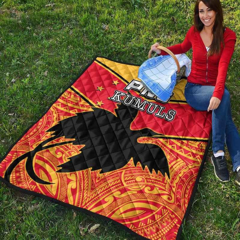 Premium quilt laid out diagonally with red, black, and yellow diamond quilting, PNG Kumuls text