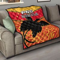 Premium quilt with red, black, and yellow diamond quilting and PNG Kumuls logo patch