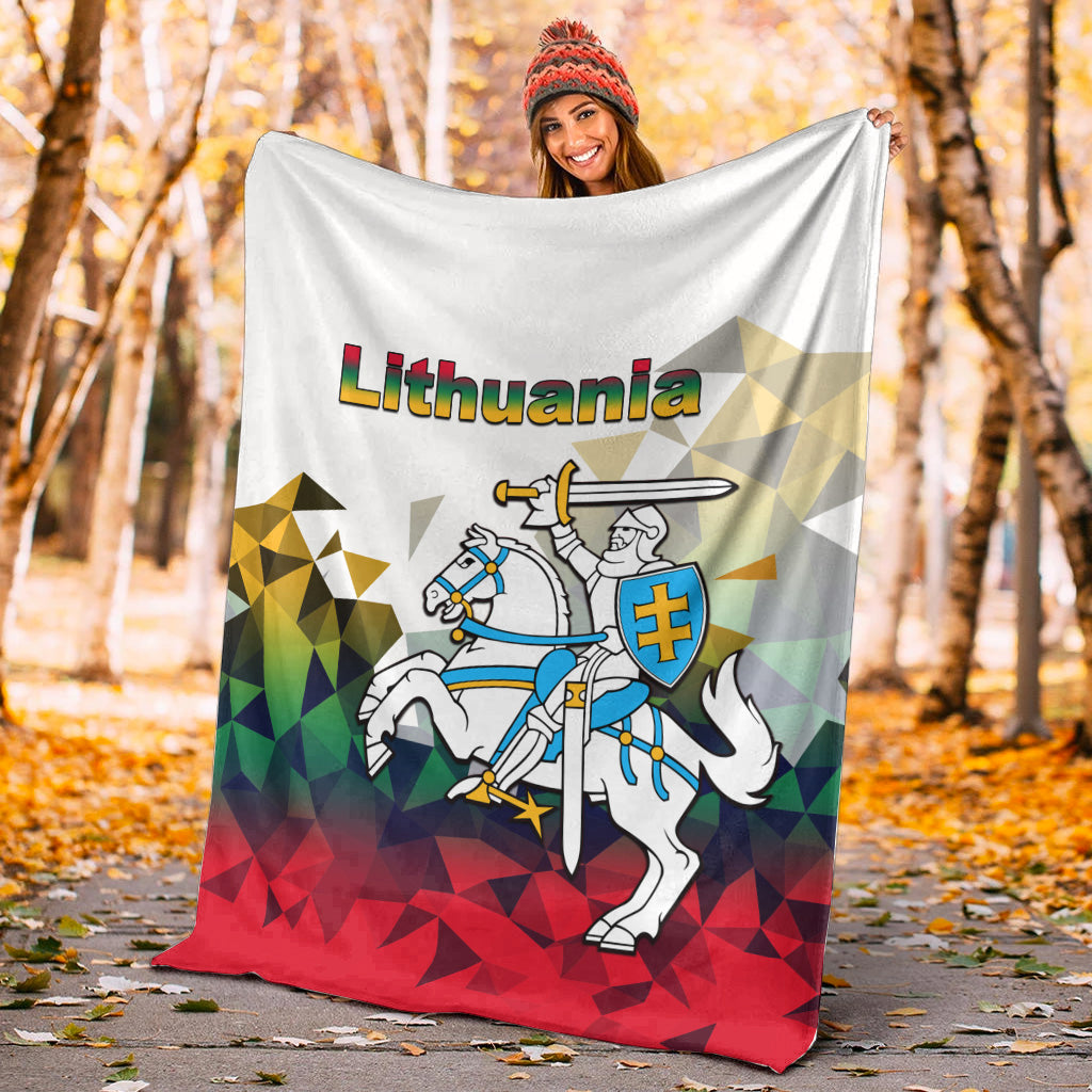 Lithuania white blanket with knight and shield graphic, red bottom with faceted triangles