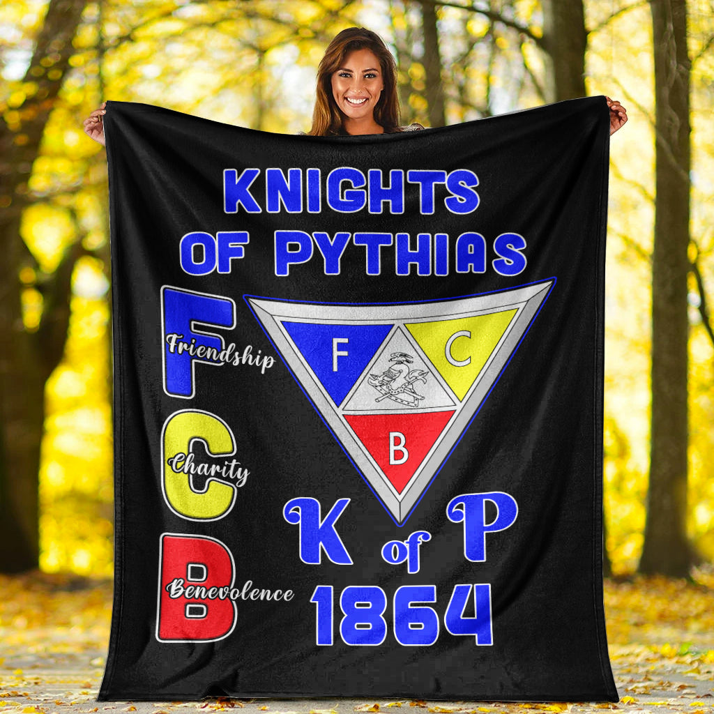 Black Knights of Pythias blanket held up, colorful crest and 1864 lettering