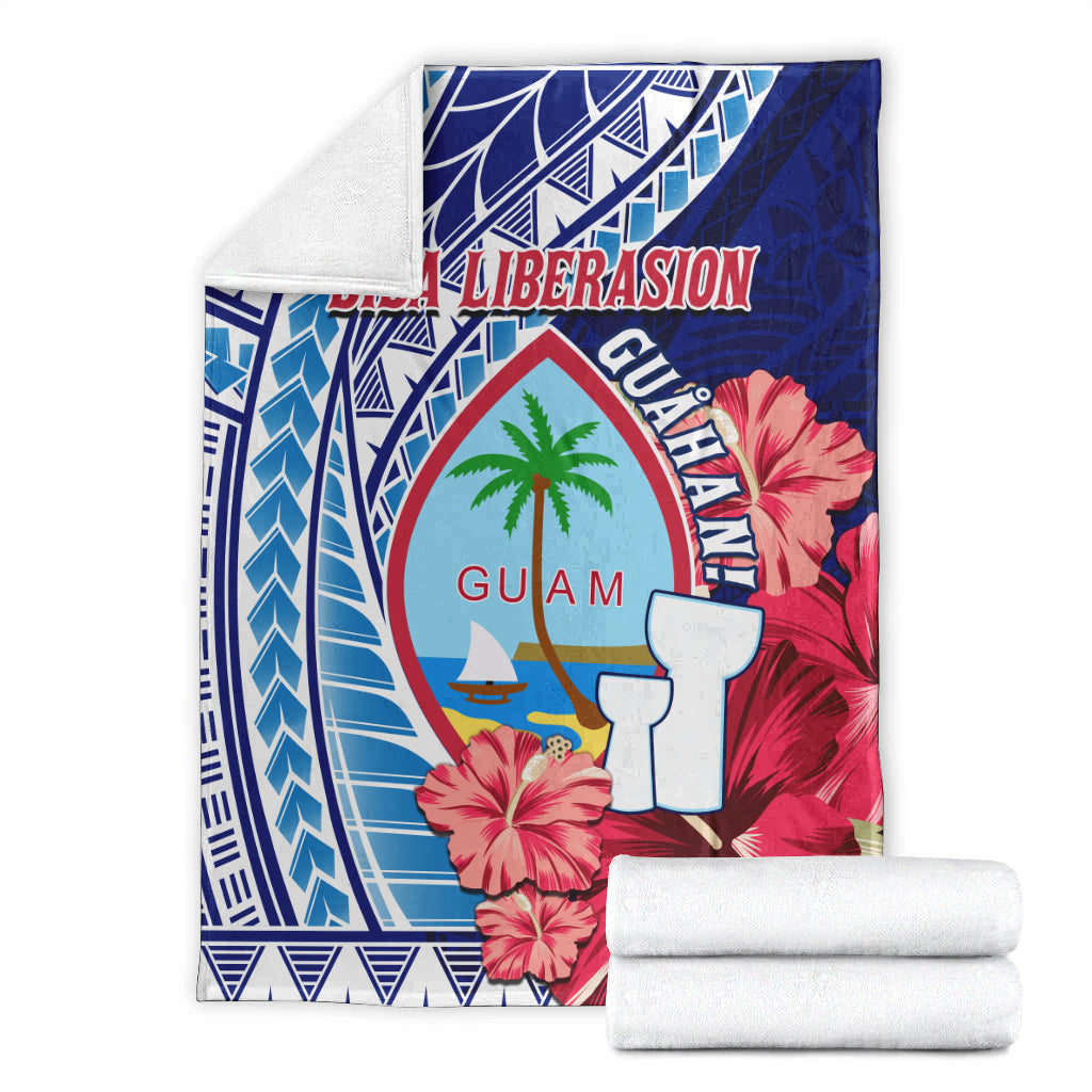 Guam Biba Liberasion blanket folded, blue and red hibiscus with palm-tree emblem