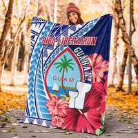 Guam Biba Liberasion blanket with blue, red hibiscus and palm-tree graphic