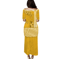 Yellow long dress back view with floral print and Polynesian geometric border