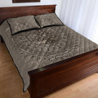 Light beige quilt bed set with dark Tree of Life center medallion and two quilted pillows