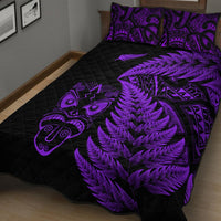 Purple and black Maori-inspired quilt bed set with fern motif and tribal face design
