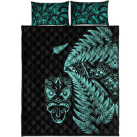 Black comforter set with turquoise fern fronds, Maori mask art, and two matching pillows