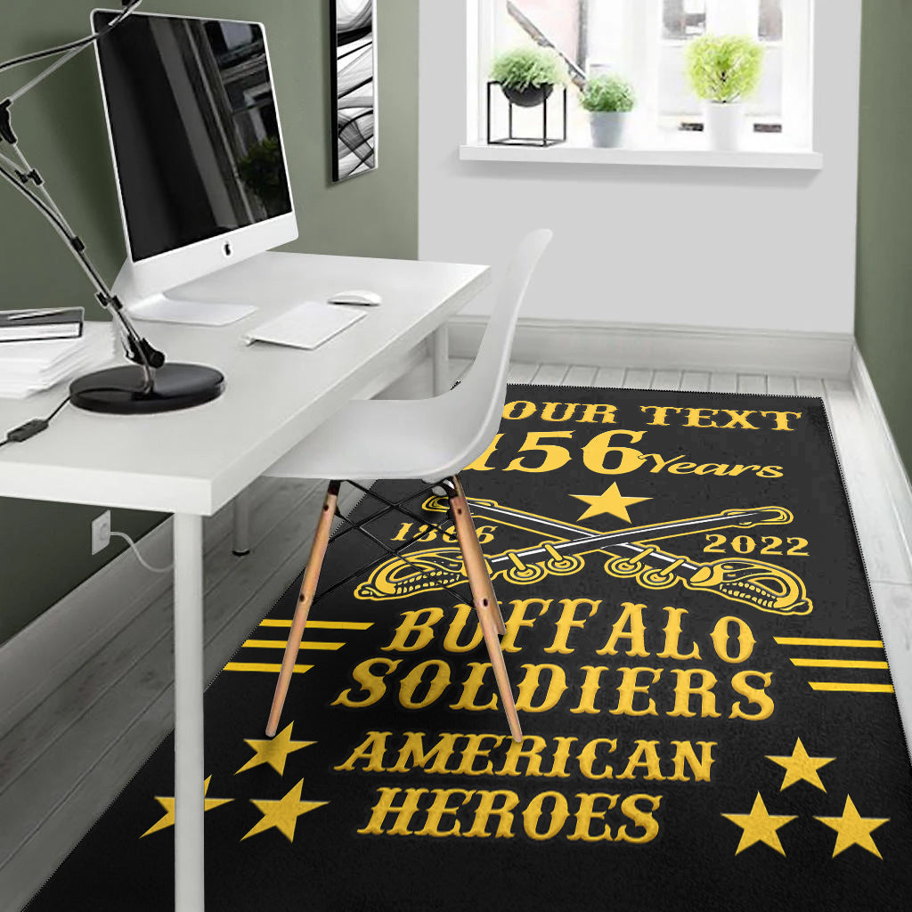 Black area rug with gold 'BUFFALO SOLDIERS' and 'AMERICAN HEROES' lettering