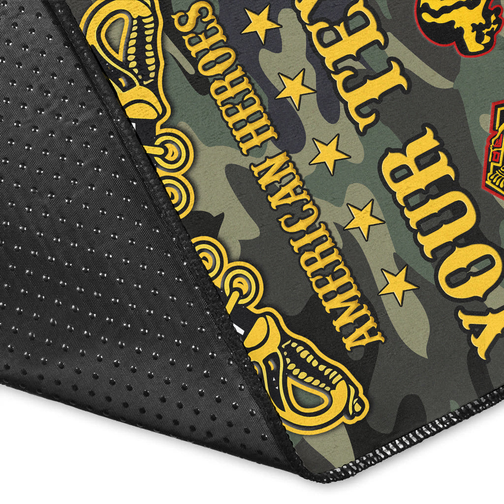 Camo rug corner detail: black dotted border and yellow-gold 'Buffalo Soldiers' text