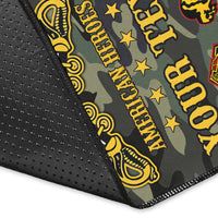 Camo rug corner detail: black dotted border and yellow-gold 'Buffalo Soldiers' text