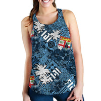 Blue women’s tank top with hibiscus and palm leaf tropical graphic, scoop neck.