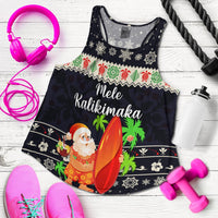 Navy racerback tank laid flat with Santa surfing graphic, snowflake and tropical motifs