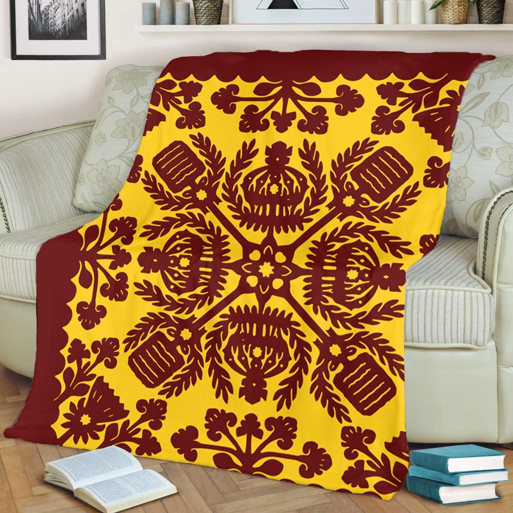 Red and yellow quilt-style blanket full pattern view with scalloped top edge