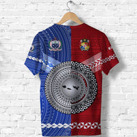 Back view red and blue T-shirt with large circular emblem and heritage patterns