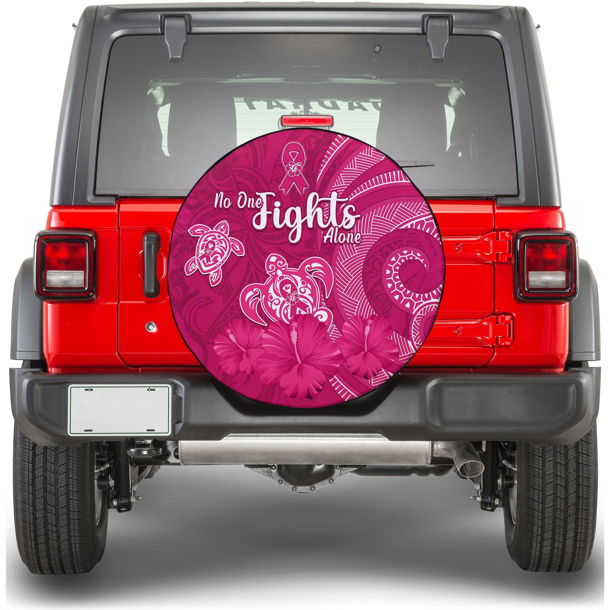 Pink round spare tire cover with hibiscus flowers and white “No One Fights Alone” lettering