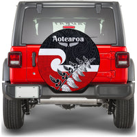 Front-mounted spare tire cover showing Aotearoa lettering with black, red, and white Maori pattern