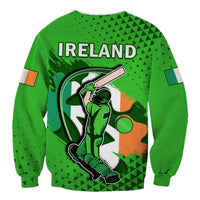 Green crewneck sweatshirt with back lettering 'IRELAND' and cricket player graphic
