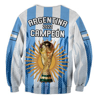 Football sweatshirt with "ARGENTINA 2022 CAMPEÓN" text and gold trophy, light blue/white stripes