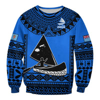 Blue rugby sweatshirt with tapa patterns, crest and triangular island graphic