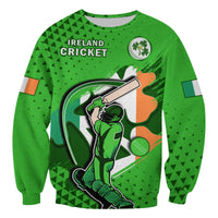 Green crewneck sweatshirt with cricket graphic and Irish crest on front