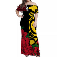 Women black off-shoulder long dress, yellow tribal mask and red hibiscus print