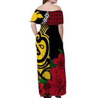 Women black off-shoulder long dress with red hibiscus flowers and yellow tribal patterns