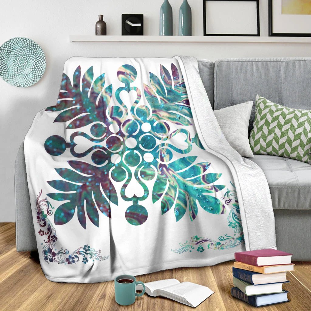 Shell white Hawaiian blanket with oversized teal-and-purple flower and scroll accents