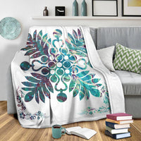 Shell white Hawaiian blanket with oversized teal-and-purple flower and scroll accents