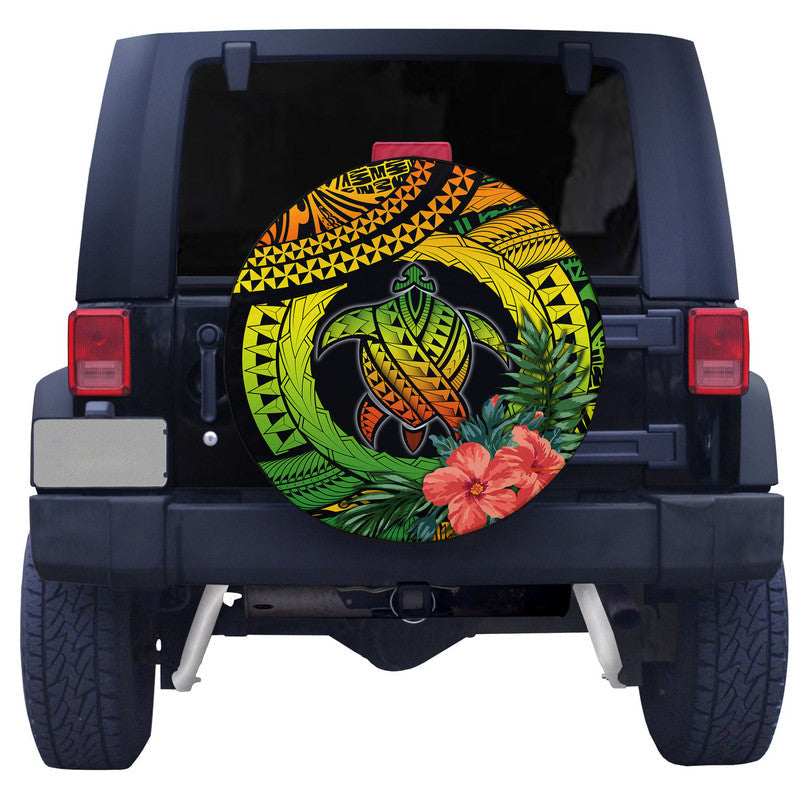 Round spare tire cover with sea turtle artwork, hibiscus bloom, and jungle leaf motif