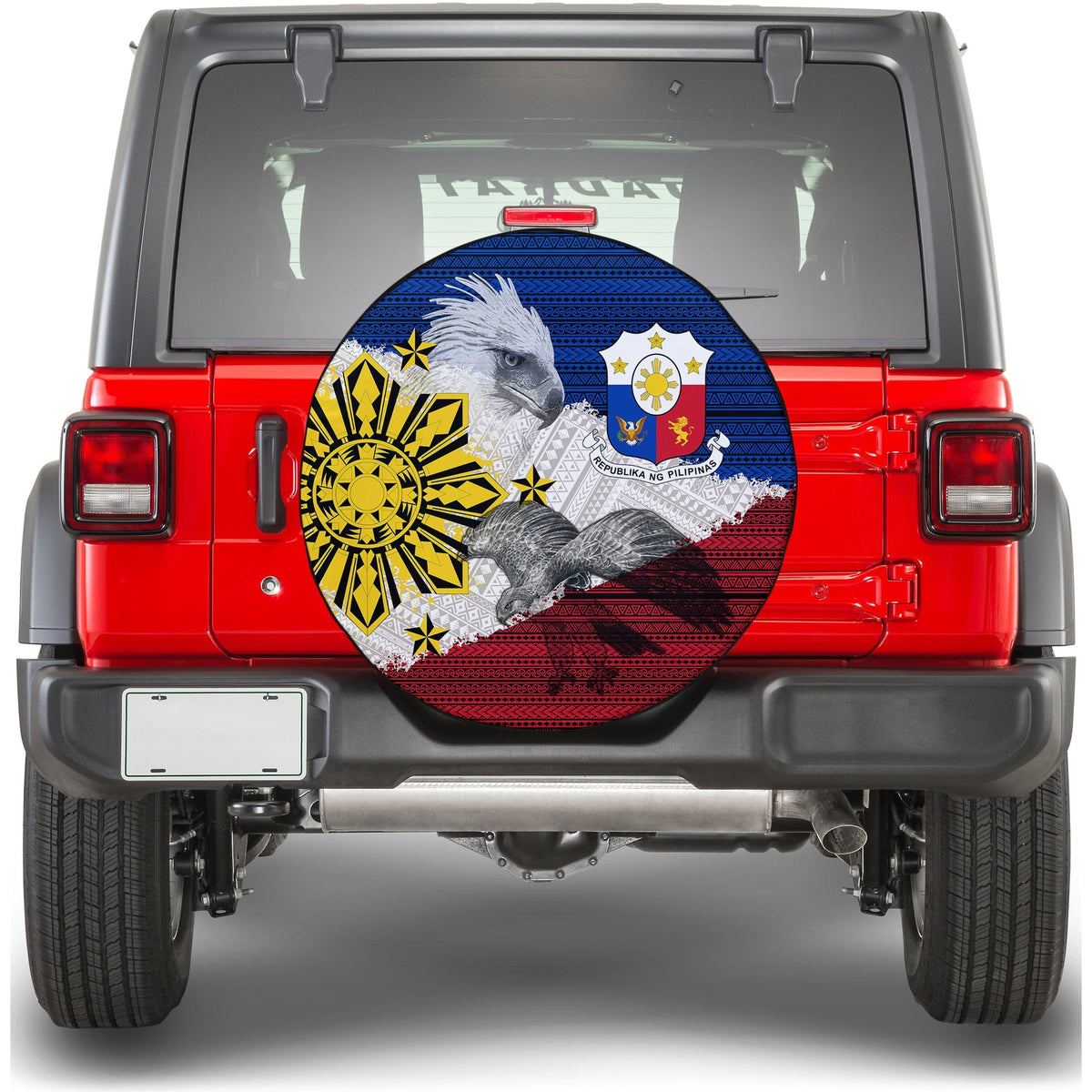 Round spare tire cover with Filipino tribal eagle and sun motif, blue red white and gold