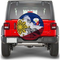 Round spare tire cover with Filipino tribal eagle and sun motif, blue red white and gold