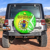 Circular spare tire cover with green “Happy Gospel Day” Polynesian emblem and stars