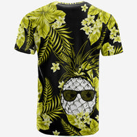 Tropical short-sleeve T-shirt with pineapple-face graphic, surrounded by green leaves and flowers