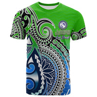 Green T-shirt with front tribal spiral graphic and Marae Moana Cook Islands print