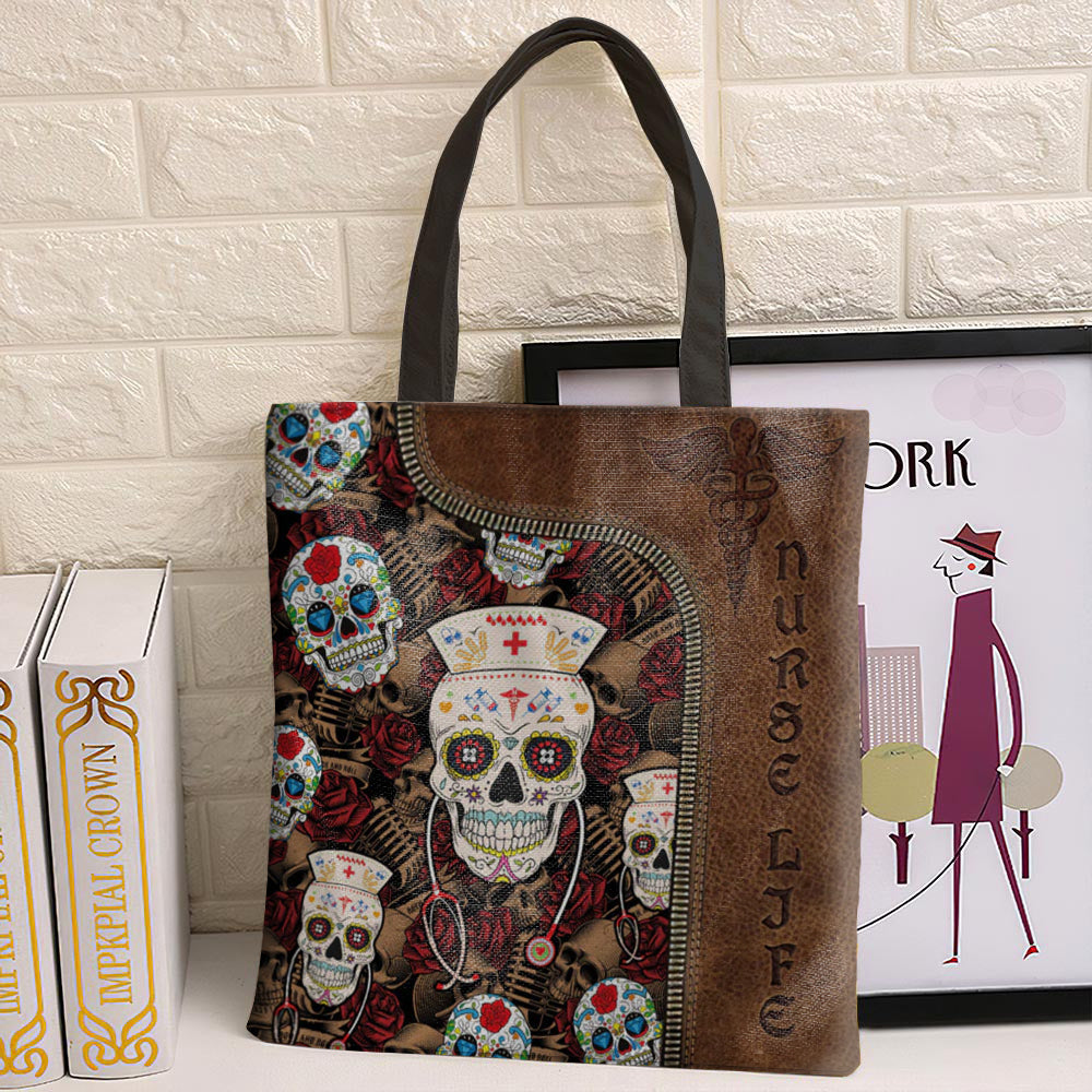 Brown tote bag with sugar skull nurse print and 'Nurse Life' text, black handles