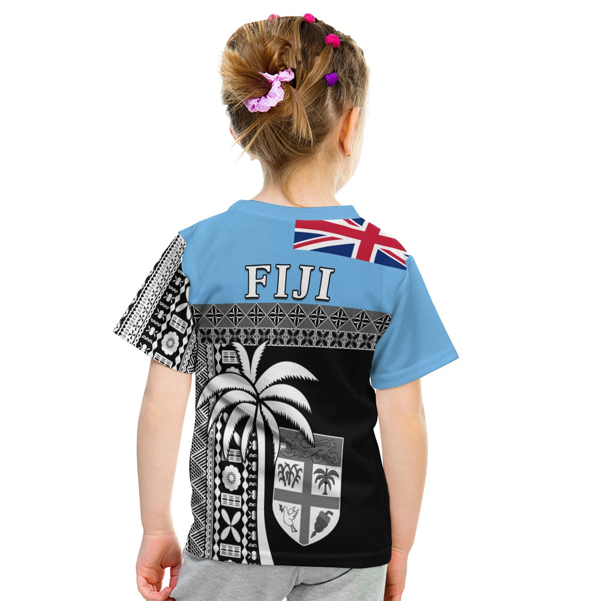 Kids blue T-shirt back view with black tapa pattern, Fiji text, crest graphic