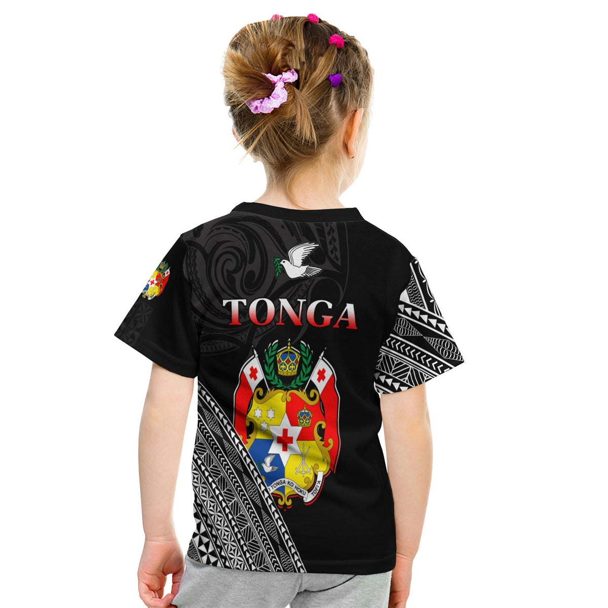 Kids black T-shirt back view with Tonga text, dove graphic, and crest