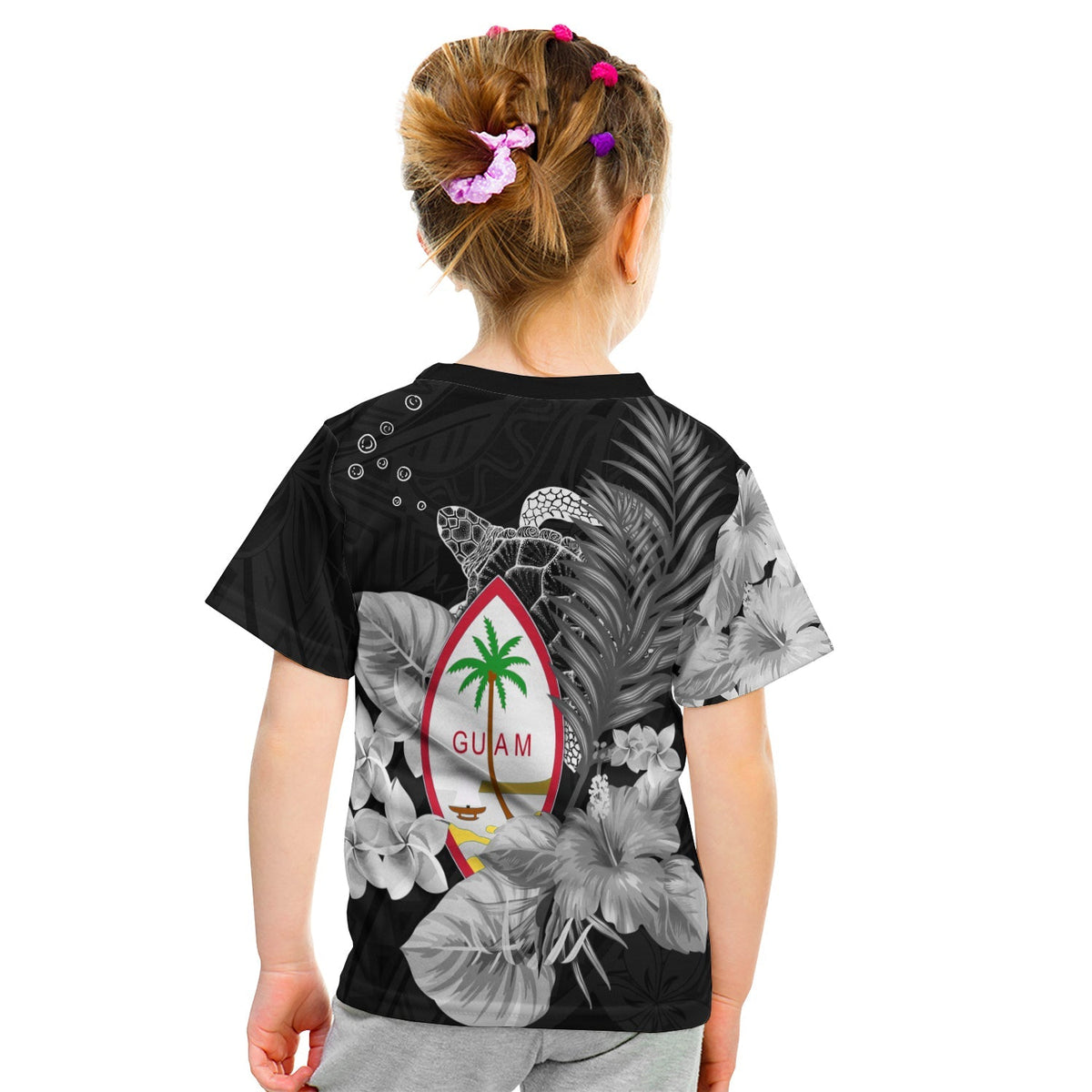 Kid Guam turtle floral T-shirt, black with back 'GUAM' surfboard and hibiscus flowers