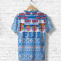 Blue tropical floral and Polynesian-style print T-shirt, back view with patterned bands