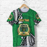 Green Polynesian T‑shirt on hanger, 'Your Text' and school crest front design