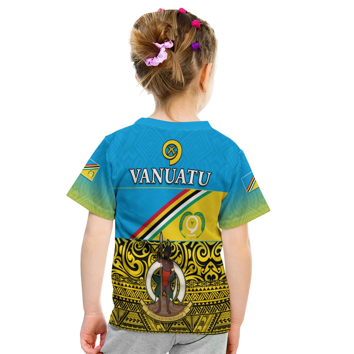 Kids blue T-shirt, back shows Vanuatu text and Torba emblem with patterned panel