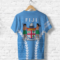 Light blue Fiji T-shirt, back crest with sailboat and dancers, patterned side chevrons