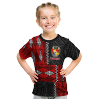 Kid Tonga tee: red/black tribal print front with crest and TONGA lettering