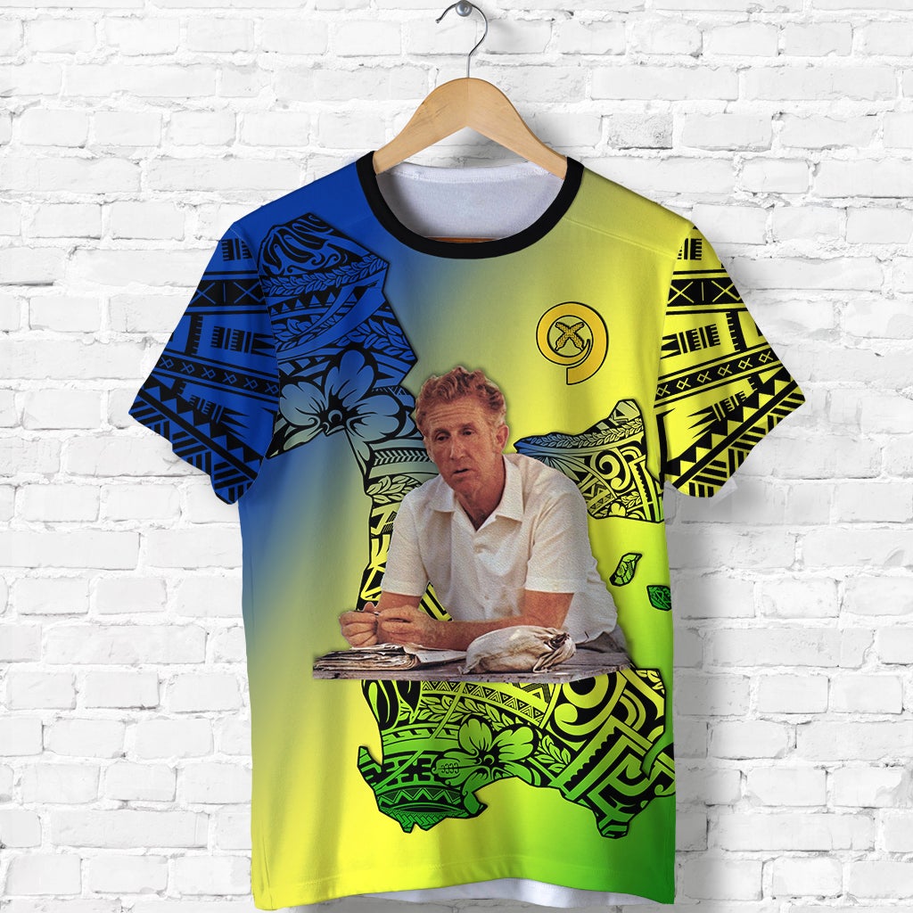 Yellow T-shirt with blue patterned sleeves and front island graphic; short-sleeve tee