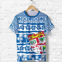 Blue Fiji tapa T-shirt with front striped floral, palm trees, and shield graphic