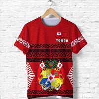 Red Tonga T-shirt with crest, TONGA text, and patterned stripes across the front