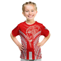 Kids red football T-shirt front on model, lion emblem and tribal side stripes