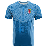 Blue Fiji-themed graphic t-shirt with crest logo and tribal pattern