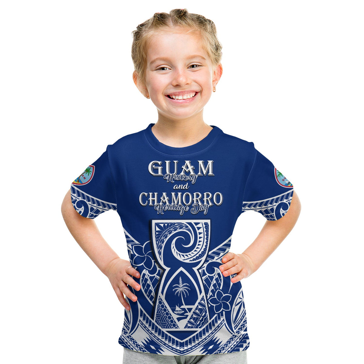 Blue youth Guam Chamorro Heritage Day T-shirt with front emblem and banner text