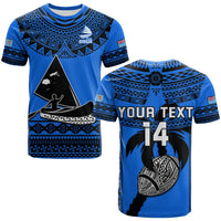 Blue rugby-style T-shirt with black triangle graphic and Polynesian pattern sleeves