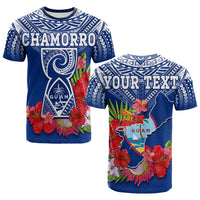 Blue Chamorro T-shirt with tribal pattern, CHAMORRO print, and hibiscus flowers